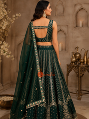 Dark green embroidered Indian lehenga set with sleeveless blouse and matching dupatta from Sumika Collection in USA