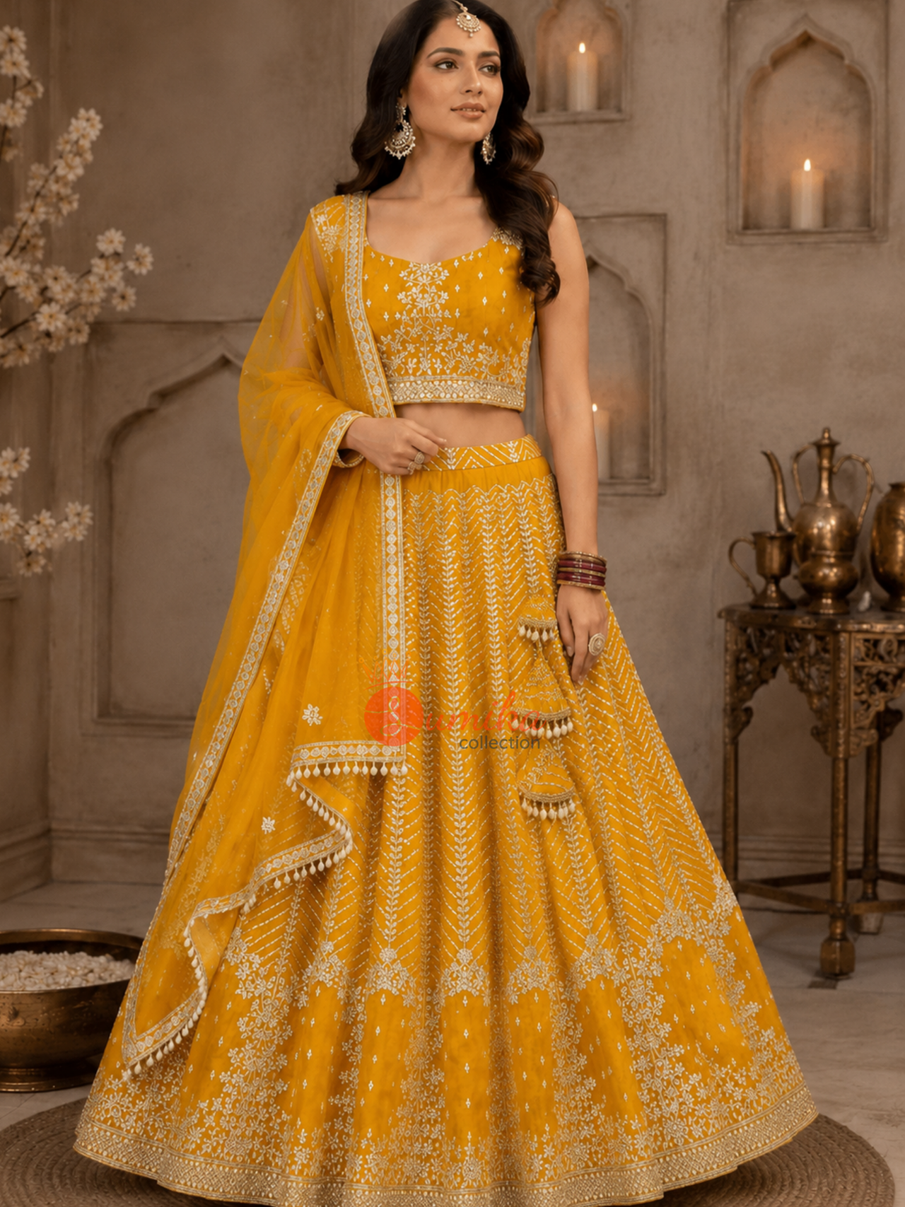 Mustard yellow Haldi and Mehendi lehenga set with embroidered sleeveless blouse and matching dupatta from Sumika Collection