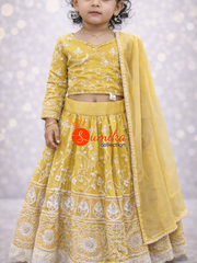 Golden yellow embroidered kids lehenga with dupatta and can-can flare from Sumika Collection USA