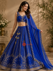 Royal blue embroidered Indian lehenga set with sleeveless blouse and matching dupatta from Sumika Collection