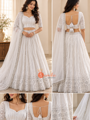 White georgette Indian lehenga set with silver embroidery, stitched blouse and matching dupatta from Sumika Collection
